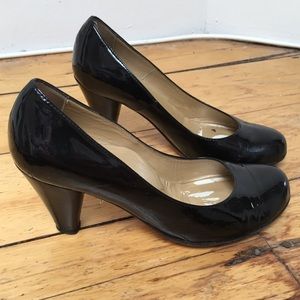 Black patent leather pumps